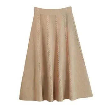 Moderna suknja za žene, koja se može nositi na zurke ili se iz dana u dan. Dizajn sa visokim strukom i slobodna suknja-trapeza,